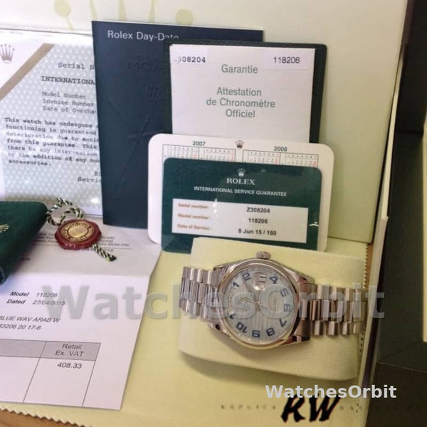 Rolex Day Date 118206 Wave Pattern Ice Blue Dial Arabic Numerals 36mm Unisex Replica Watch